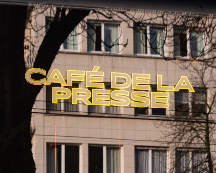 The storefront of Café de la Presse on Avenue Louise, Brussels
